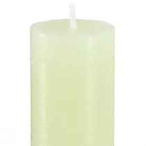 Product Table candles light green candles dyed through 34x240mm 4 pcs